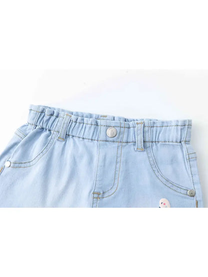 Short in denim con fenicottero