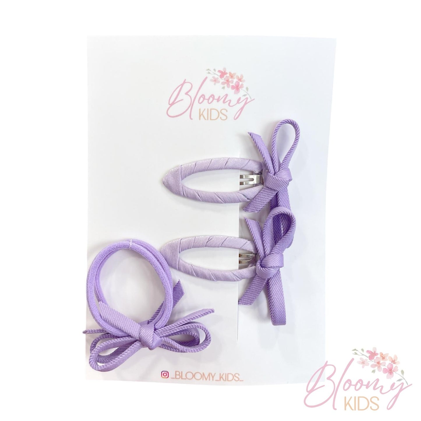 Set clip ed elastici con fiocchetto